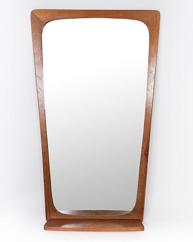 Mirror in teak with shelf of Danish design from the 1960s.
5000m2 showroom.
