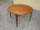 Round dining table in teak  with from the 1960s.5000m2 showroom.