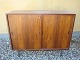 Low sideboard in rosewood with steel legs Danish design from 1960 5000 m2 showroom