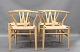 4 Hans Wegner chairs, the Y chair ch 24 model with hand woven seats in lacquered ash. 5000 m2 showroom