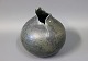 Grey ceramic vase by an unknown artist.5000m2 showroom.