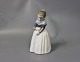 Royal Copenhagen porcelain figure, girl in a dress, no.: 1251.5000m2 showroom.