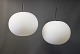 A pair of Glo-Ball pendants designed by Jasper Morrison in 1998 for FLOS.5000m2 showroom.