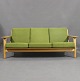 3 seater sofa, model GE290, in oak and green Hallingdal wool, by Hans J. Wegner and Getama.5000m2 showroom.
