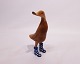 Figurine in the shape of a duck with blue rain boots, in bamboo by Dcuk.5000m2 showroom.