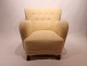 Easy chair from around the 1930s, newly upholstered with sheep wool.5000m2 showroom.