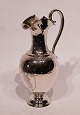 Water jug beautifully decorated of hallmarked silver.5000m2 showroom.