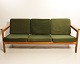 Sofa in oak and upholstered with green fabric, model J103 by Børge Mogensen for 
FDB from the 1960s.
5000m2 showroom.
