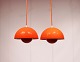 A pair of Flowerpot, model VP1, pendants in orange designed by Verner Panton in 1968 and manufactured in the 1970s.5000m2 showroom.