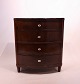 Empire chest of drawers of polished mahogany, the drawers are decorated with morther of pearl and from around the 1820s.5000m2 showroom.