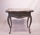 Grey painted rococo shaped tile-table decorated with different motives, from the 1780s.5000m2 showroom.