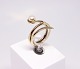 Ring of 14 ct. gold decorated with a cultured pearl and stamped PD.5000m2 showroom.