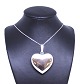 Necklace of 835 silver and heart shaped pendant of 925 sterling silver stamped H.S.5000m2 showroom.