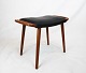 Stool in teak and upholstered with black elegance leather of dansih design from the 1960s.5000m2 showroom.