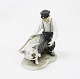 Royal Copenhagen porcelain figure, boy with pig, no.: 848.5000m2 showroom.
