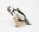 Porcelænsfigur af spætte, nr.: 1717 af Jens Peter Dahl Jensen for B&GFlot stand
