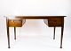 Desk in rosewood of danish design from the 1960s.5000m2 showroom.