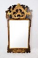 Mirror in Rococo style and walnut from around 1740.
