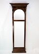 Slim mirror of mahogany, in great antique condition from the 1840s. 
