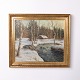 Signed painting on canvas depicting a snowy landscape, framed