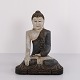 Buddha figure in carved wood with light and blue-toned patina from Thailand, 1920s