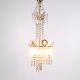 Antique Crystal Chandelier in Gilt Bronze with Louvre Style Decorations 1890s
