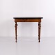 Antique games table in mahogany and walnut with brass fittings from the 1860s